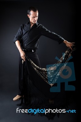 Young Flamenco Dancer In Beautiful Dress On Black Background Stock Photo