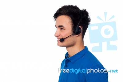 Young Friendly Guy Wearing Headset Stock Photo