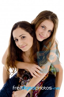 Young Friends Riding Piggyback Stock Photo