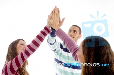 Young Friends With Joined Hands Stock Photo