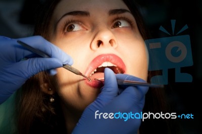 Young Girl Having Dental Check Up Stock Photo