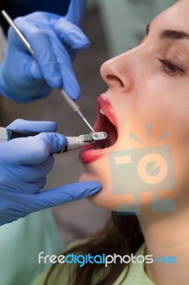 Young Girl Having Dental Check Up Stock Photo