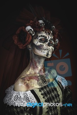 Young Girl In The Image Of Santa Muerte Stock Photo