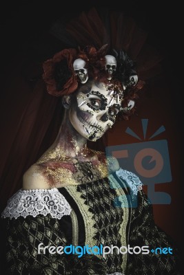 Young Girl In The Image Of Santa Muerte Stock Photo