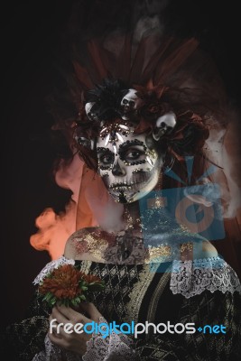 Young Girl In The Image Of Santa Muerte Stock Photo