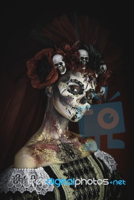 Young Girl In The Image Of Santa Muerte Stock Photo