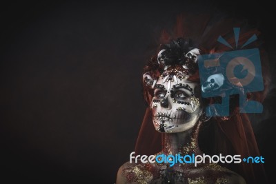 Young Girl In The Image Of Santa Muerte Stock Photo