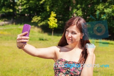 Young Girl Making Selfie In A Park Stock Photo