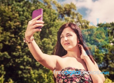 Young Girl Making Selfie In A Park Stock Photo