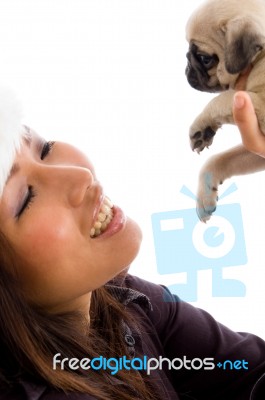 Young Girl Playing With Puppy Stock Photo