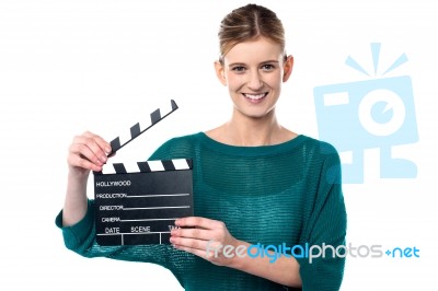 Young Girl Posing With Clapperboard Stock Photo