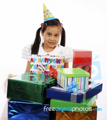 Young Girl Receiving Presents Stock Photo