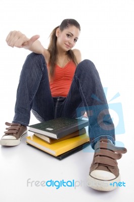 Young Girl Showing Thumbs Up Stock Photo