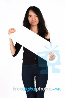 Young Girl Smiling Holding Blank Card Stock Photo