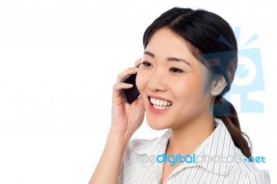 Young Girl Speaking Over Cell Phone Stock Photo