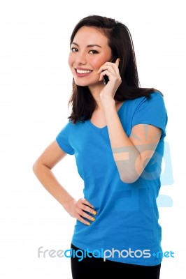 Young Girl Speaking Over Cellphone Stock Photo