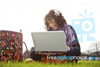 Young Girl Using Laptop Stock Photo