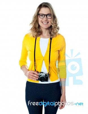 Young Girl With A Camera Stock Photo