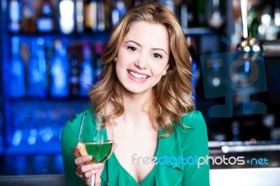 Young Girl With A Glass Of Champagne Stock Photo