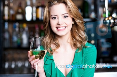 Young Girl With A Glass Of Champagne Stock Photo