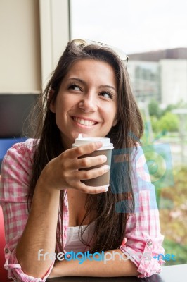 Young Girl With A Warm Drink Stock Photo