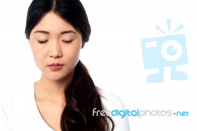 Young Girl With Closed Eyes At Peace Stock Photo