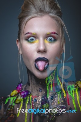 Young Girl With Creative Makeup With Butterflies Stock Photo