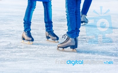 Young Girls Are Skating. Feet Closeup Stock Photo