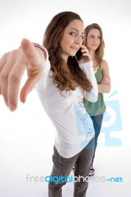 Young Girls Posing With Hand Gesture Stock Photo