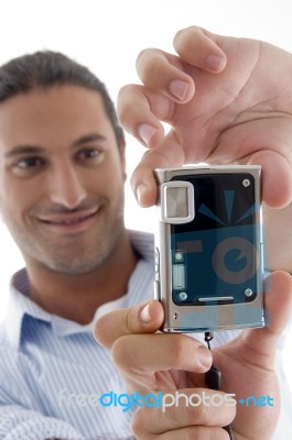 Young Good Looking Man Clicking Photograph Stock Photo