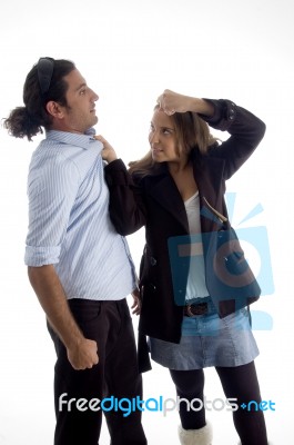 Young Good Looking Woman Dominating Her Boyfriend Stock Photo