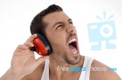 Young Guy Enjoying Rock Music With Full Volume Stock Photo