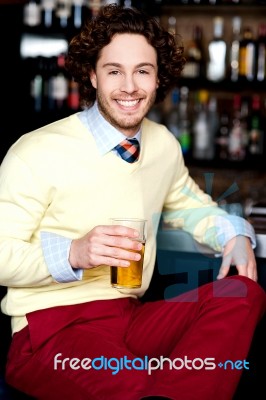 Young Guy Having Chilled Beer At Bar Stock Photo