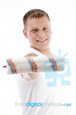 Young Guy Holding Rolling Brush Stock Photo