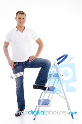 Young Guy Holding Rolling Brush Stock Photo