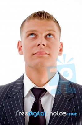 Young Guy Looking Upwards Stock Photo