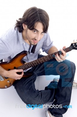 Young Guy Playing Melody Stock Photo