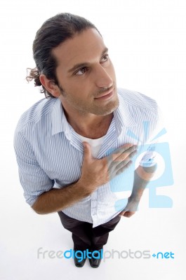 Young Guy Presenting Respect To Our Nation Stock Photo