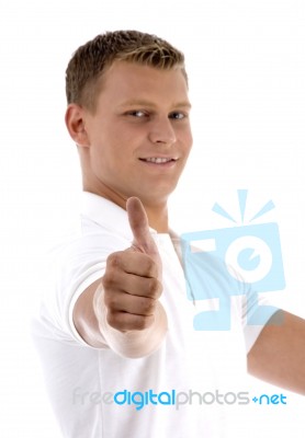 Young Guy Showing Thumbs Up Stock Photo