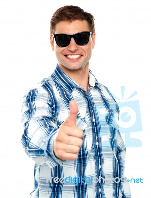 Young Guy Showing Thumbs Up Stock Photo