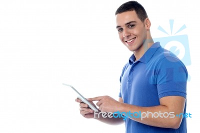 Young Guy Using Tablet Pc Stock Photo