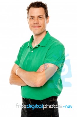 Young Guy With Crossed Arms Stock Photo