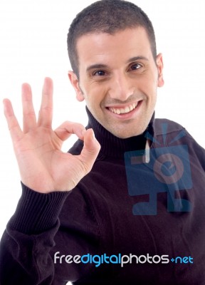 Young Guy With Okay Hand Gesture Stock Photo