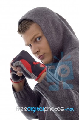 Young Handsome Guy Showing Fists Stock Photo