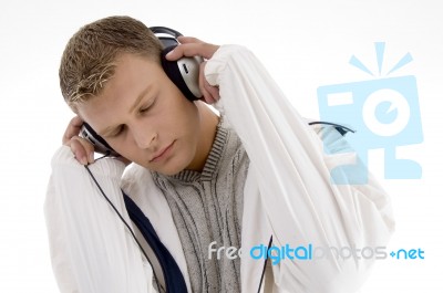 Young Handsome Man Enjoying Music With Headphones Stock Photo