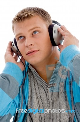 Young Handsome Man Enjoying Music With Headphones Stock Photo