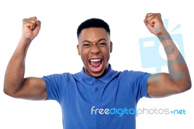 Young Handsome Victorious Guy Stock Photo