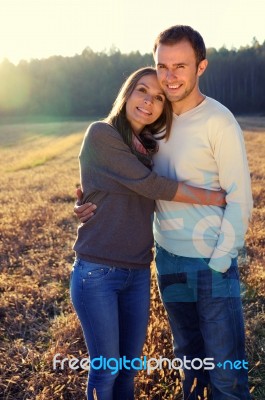 Young Hugging Couple Stock Photo