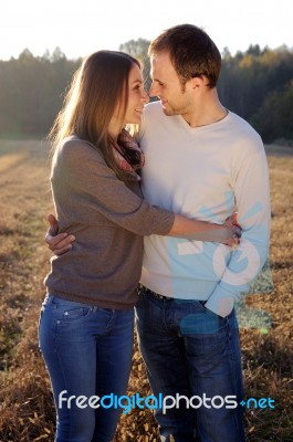 Young Hugging Couple Stock Photo