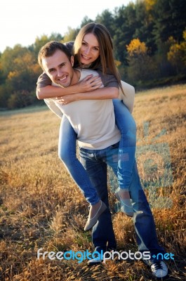 Young Hugging Couple Stock Photo